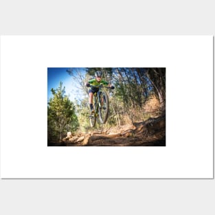 Close up image of a mountain biker getting air Posters and Art